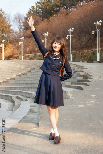 Friendly High School Girl Saying Hello, Youthful Student Looking at Camera, Girl in Uniform Walking to School