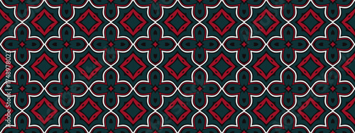 A traditional geometric pattern featuring repeating diamond and quatrefoil shapes in dark navy and maroon.