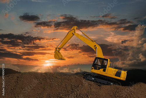 Crawler excavator with are digging the soil in the construction site on the sunset  backgrounds
