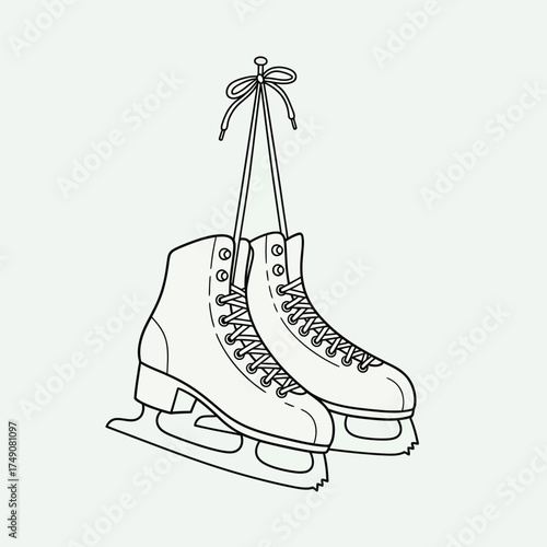 Pair of ice skates hanging by their laces, isolated on white background classic winter sport equipment for skating on ice
