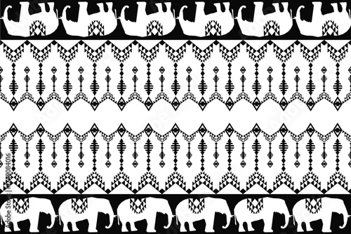 Black and white Thai elephant tribal pattern with geometric ethnic motifs. Inspired by traditional Southeast Asian textile art, this seamless design combines elephants and tribal ornaments, symbolizin
