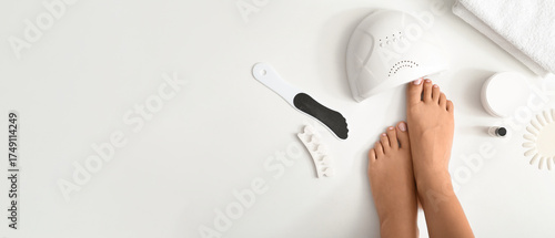 Female legs with supplies f...