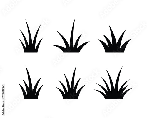 Minimalist black and white vector illustrations of grass clumps for scalable design projects silhouette