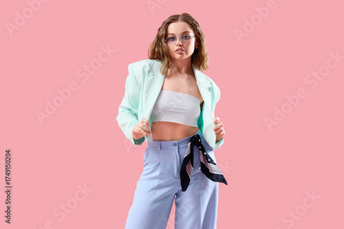 Beautiful young woman in st...