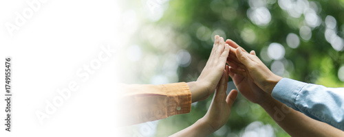 Environmental concept, business people join forces on World Environment Day and global community teamwork the global environment, society and environment CSR and sustainable development. Copy space