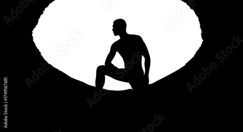 Cuadro en lienzo Silhouette man contemplating the vast unknown from a dark cavern opening, symbolizing hope and exploration