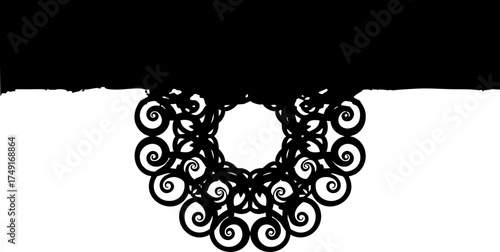Elegant black ornamental flourish with swirling patterns creates a sophisticated decorative element for design projects, adding a touch of classic style and intricate beauty.