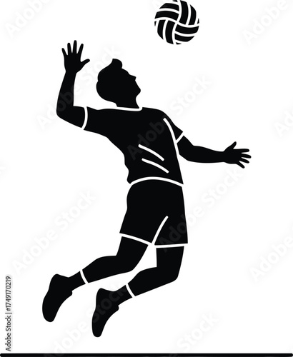 Silhouette of a male volleyball player spiking the ball during a game