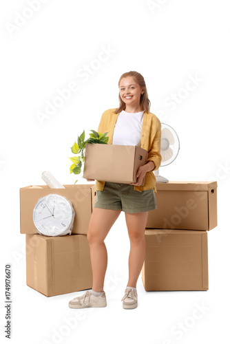Young woman with moving box...