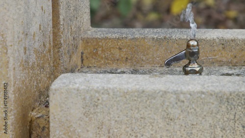 Stone Faucet in a Park