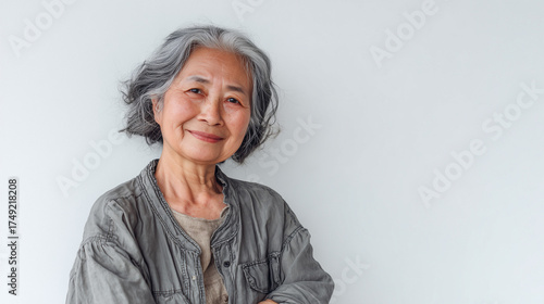 an old woman asian person wearing casual, half body, standing middle of image in soft bright digital background
