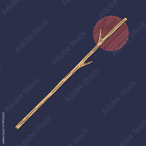 A long wooden stick casting a shadow with a circular design in the background.