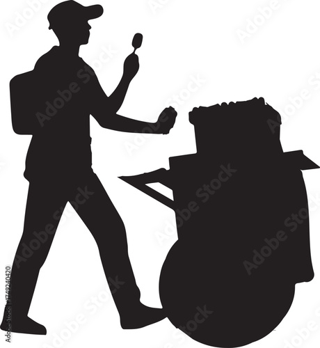 Silhouette of a street vendor standing in an alley next to a popcorn stand, wearing a baseball cap, and holding a spoon.