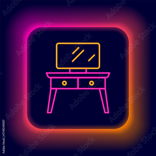 Glowing neon line Dressing table icon isolated on black background. Colorful outline concept. Vector