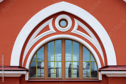 Wallpaper Mural A striking architectural arch frames a large window set in a bold red wall Torontodigital.ca