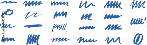 Collection of abstract blue brush strokes and scribbles with a handmade artistic feel