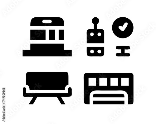 Hotel amenities featuring a bed, television, remote, and air conditioning