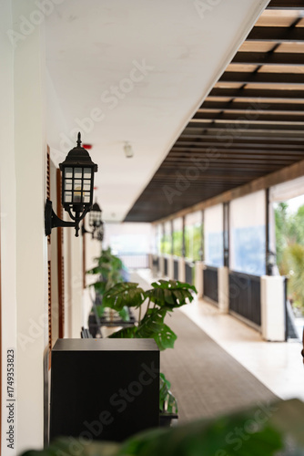 an antique lamp in the hallway on a bright sunny day
