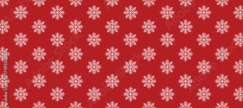 Seamless pattern of white snowflakes on vibrant red background, ideal for Christmas and winter themes. Repeating design, festive and modern, perfect for seasonal decoration, wrapping paper
