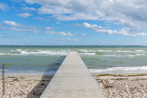 Jetty into baltic Sea at public bath of Rude Strand, Odder, Denmark