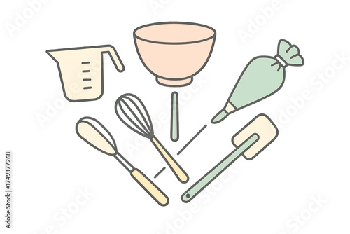 Essential kitchen tools for baking and cooking preparation including bowl whisk and spatula