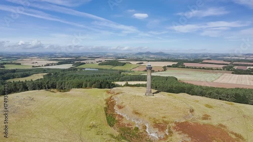 Waterloo Monument over Scottish fields and farms from a drone, Jedburgh, Scotland, UK
