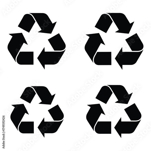 Four black recycling symbols arranged in a grid representing eco-friendly waste management and sustainability concepts silhouette