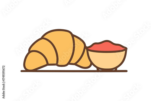 Freshly baked croissant served with a side bowl of sweet fruit jam