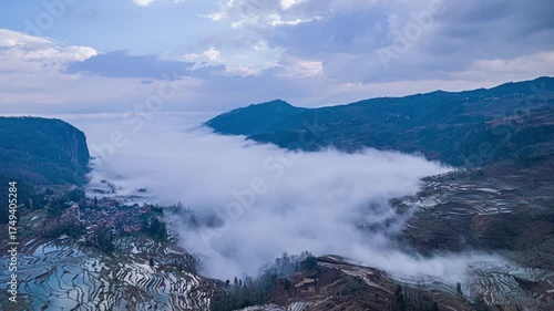 Yuanyang Rice Terraces Aerial View at Dawn with Morning Mist and Clouds, China