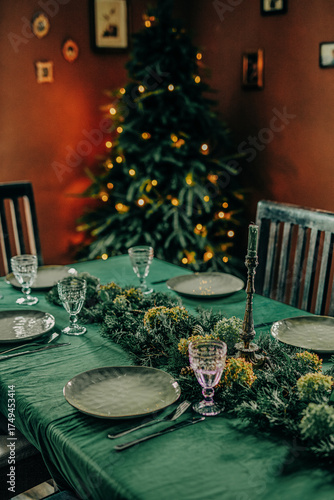 Christmas dinner table with festive decorations and vintage style interior