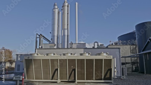 Wallpaper Mural Detailed view of a part of a modern biogas installation in rural Denmark, showing clean energy infrastructure producing renewable gas from organic waste. Torontodigital.ca