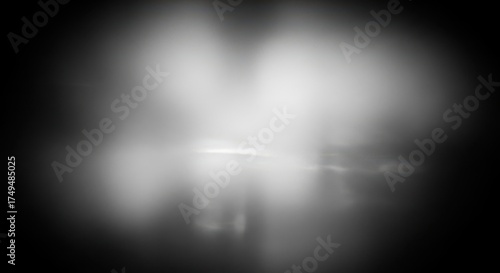 Soft focus black and white abstract blur with vignette and light diffusion, emotional monochrome film photography aesthetic