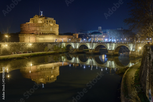 Castel Sant'Angelo with bridge illuminated at night, Italy, Rome