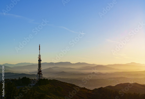 Communications tower. Antennas at sunset on Mount Jaizkibel, Basque Country