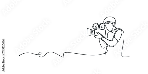 Filmmaker with vintage camera captures moment