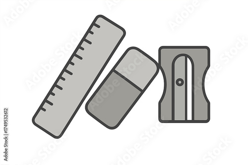 Collection of essential gray school supplies: ruler, eraser, and sharpener