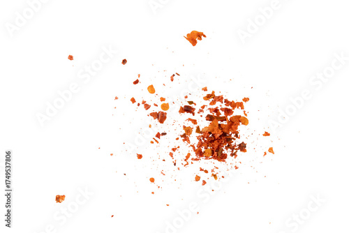 Flying crushed red pepper flakes scattered in air creating spicy seasoning texture and dynamic food explosion concept for cooking, hot flavor design, and culinary background