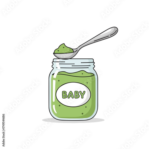 Baby food in jar with spoon for health and nutrition, green baby food preparation in glass jar. Spoon with baby food for kid's growth and development.