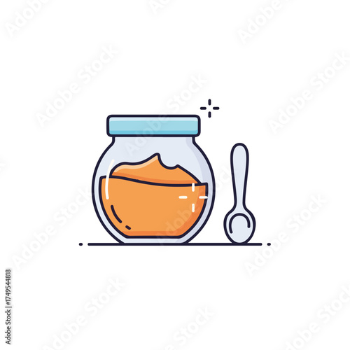 Fresh nut butter in cute little jar beside spoon, healthy food. Nut butter contains nutritious elements, like various oils, seeds and paste, creating natural breakfast spread.