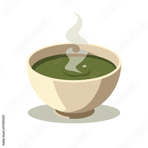 Fresh matcha tea in ceramic bowl with rising steam over white background. Hot matcha tea, an invigorating healthy beverage, steams gently in ceramic ware.