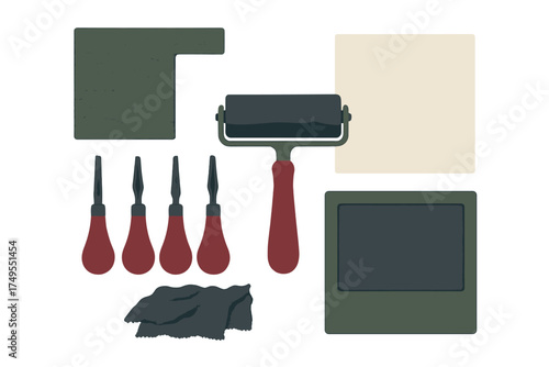 Traditional printmaking tools and equipment including brayer, block, and carving gouges