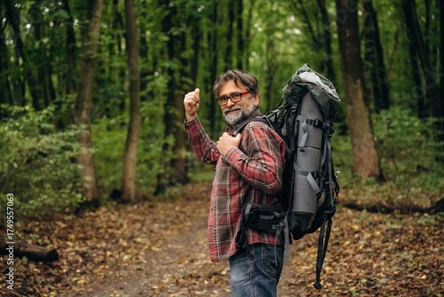 Wallpaper Mural Greetings, hello hand gesture. Hiking experience, senior man is in the forest at daytime Torontodigital.ca