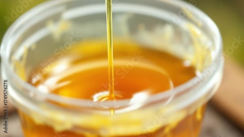 Golden Honey Drizzling - A Sweet and Natural Delight in a Jar.