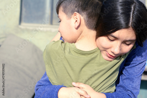 Happy loving little latin siblings.
