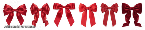 Red bow set including satin, grosgrain, and velvet ribbons isolated. Festive decor and gift wrapping collection.