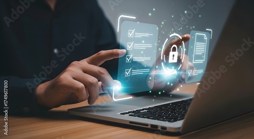 Person interacting with a secure digital interface on a laptop showcasing cybersecurity and data protection concepts