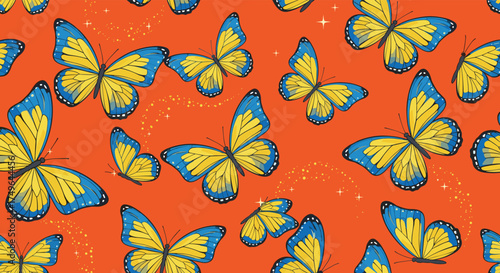 A vibrant swarm of yellow and blue butterflies gracefully dances across a warm orange backdrop.