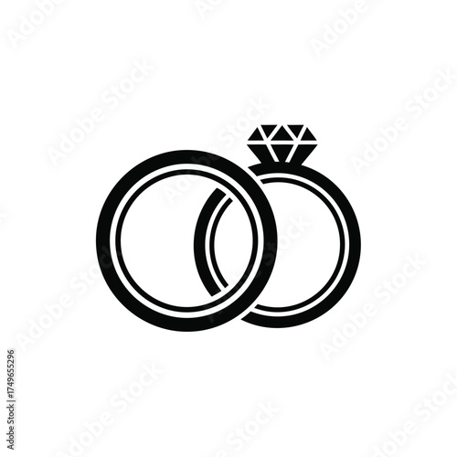 Two interlocking rings one with a diamond wedding rings