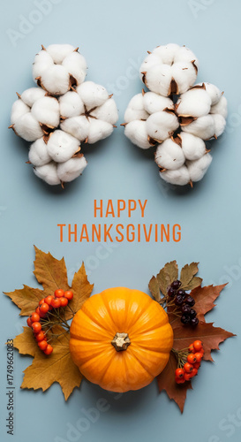Wallpaper Mural Flatlay autumn composition featuring cotton, pumpkin, berries, and leaves on a blue background Thanksgiving greeting Torontodigital.ca