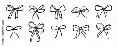 Black hand drawn bows in crayon hand drawn style. Brush ribbon illustrations isolated on white background.